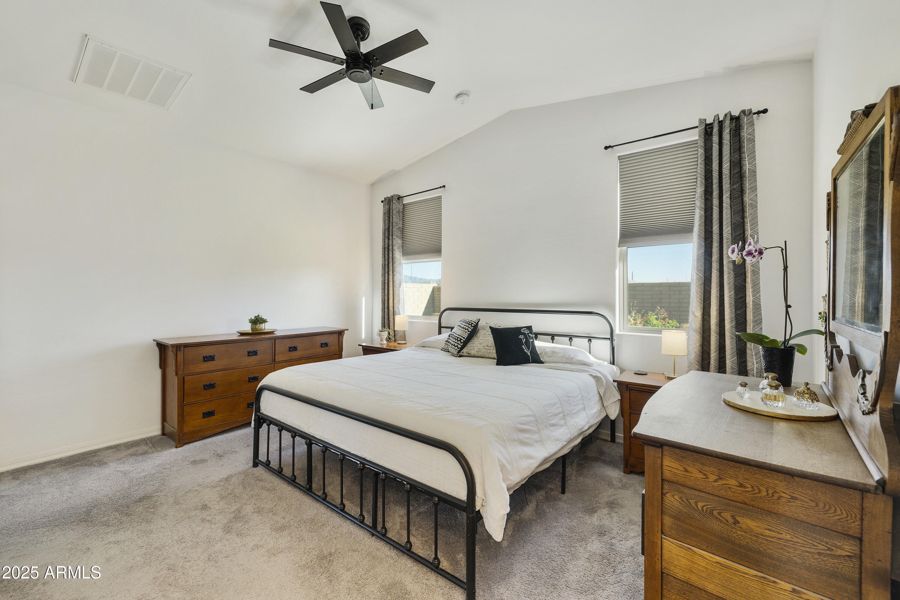 5813 South Del Rancho Mesa, AZ 85212 - Photo 15 of 47 a bedroom with a bed and a dresser