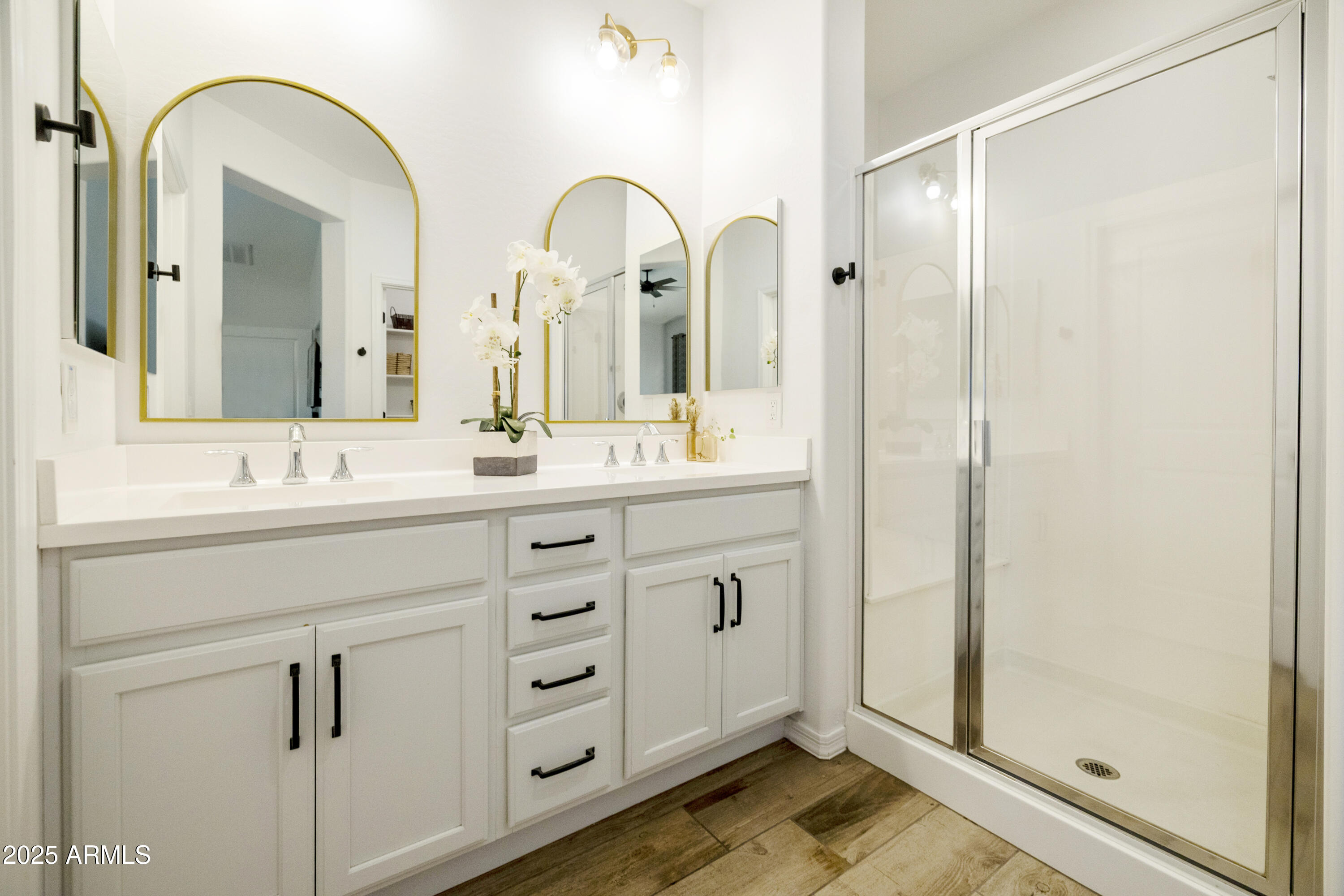 5813 South Del Rancho Mesa, AZ 85212 - Photo 16 of 47 a bathroom with a double vanity sink and mirror
