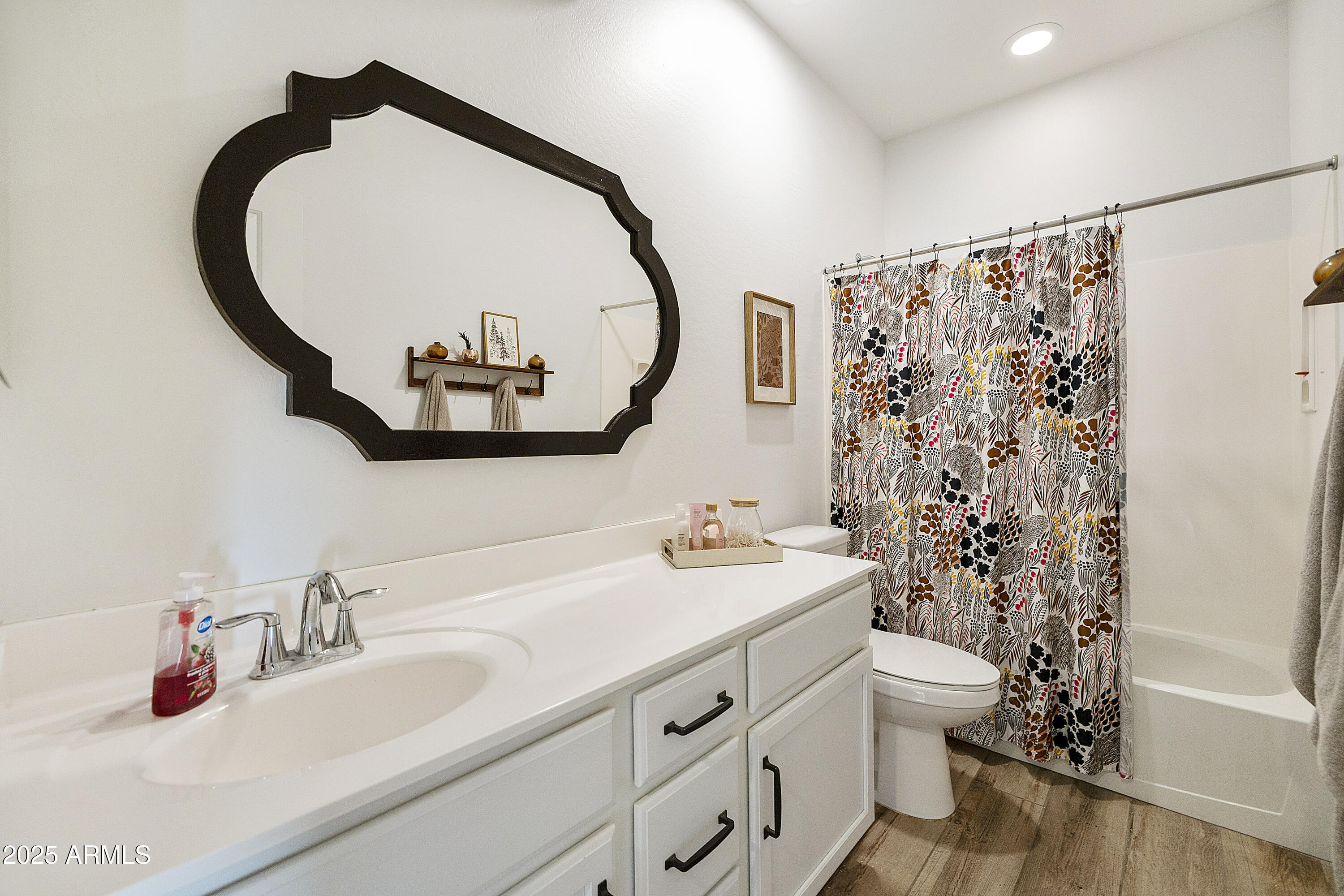 5813 South Del Rancho Mesa, AZ 85212 - Photo 22 of 47 a bathroom with a sink and a mirror