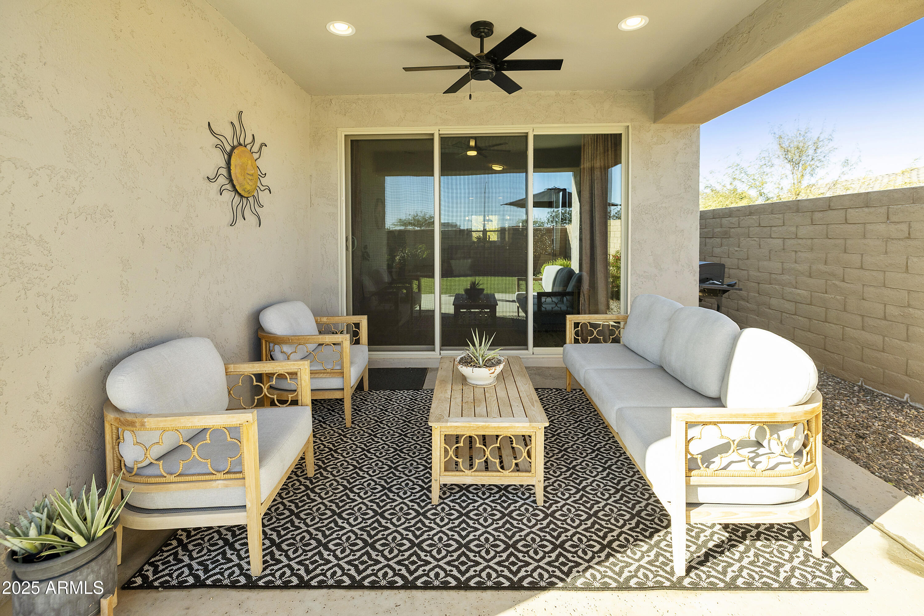 5813 South Del Rancho Mesa, AZ 85212 - Photo 23 of 47 a living room with a rug