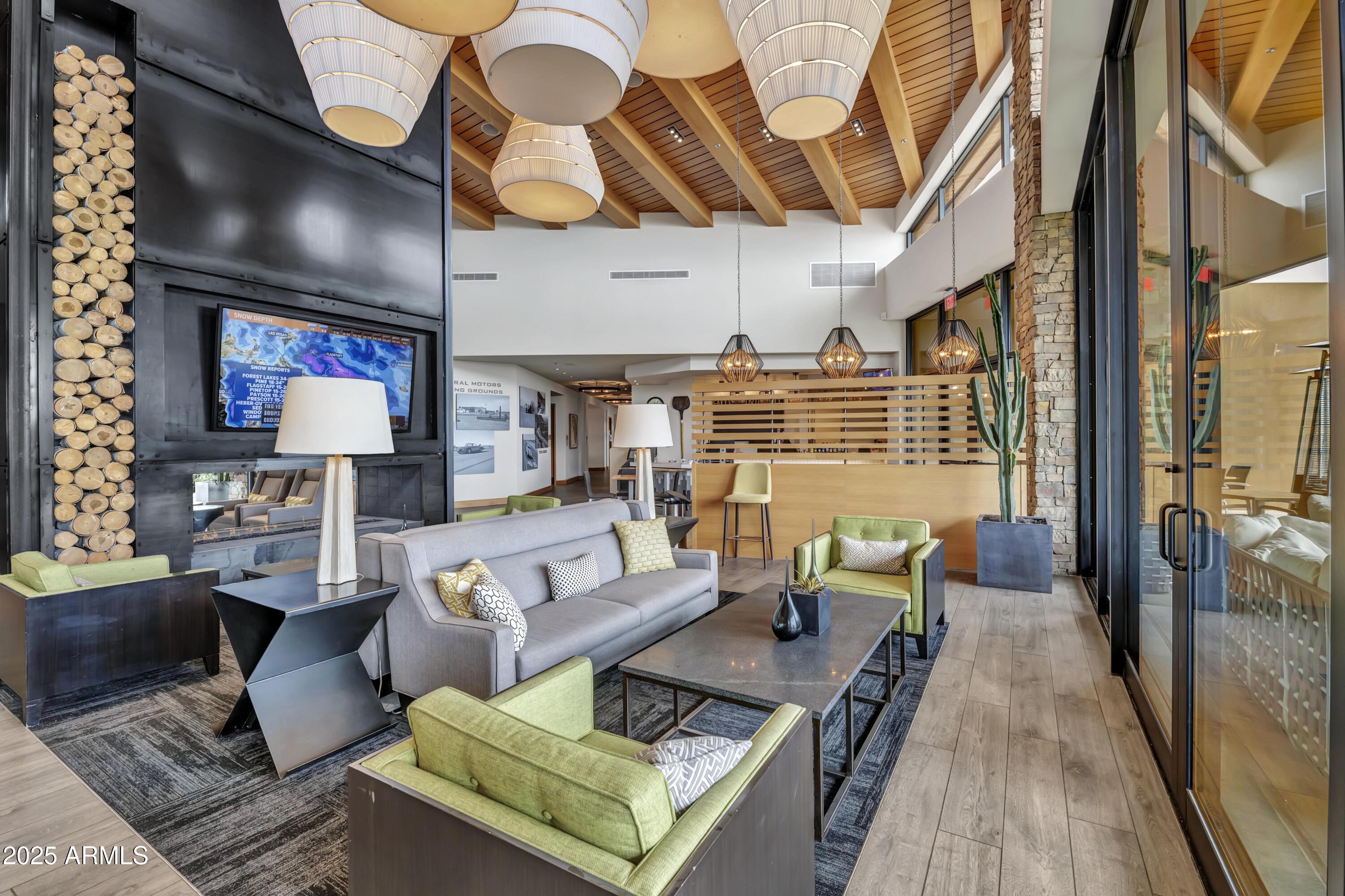 5813 South Del Rancho Mesa, AZ 85212 - Photo 35 of 47 a living room with furniture and a wooden floor