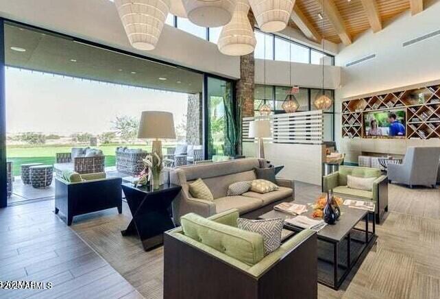 5813 South Del Rancho Mesa, AZ 85212 - Photo 36 of 47 a living room with furniture and a large window