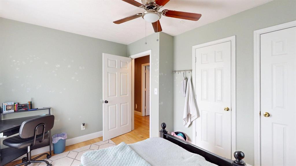 1766 Boss Range Road Justin, TX 76247 - Photo 26 of 35 a bedroom with a bed and a window