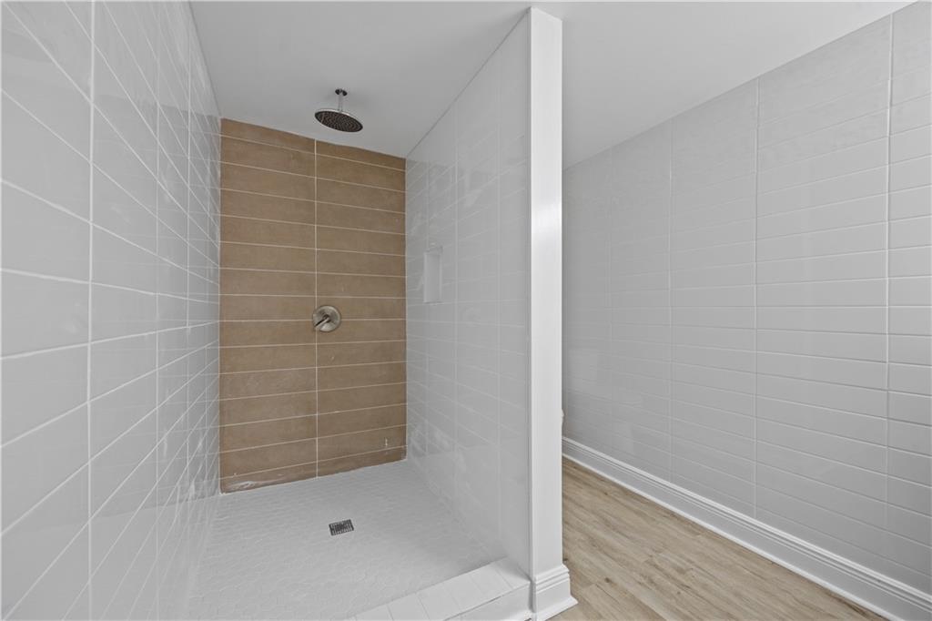 1658 Temple Avenue Atlanta, GA 30337 - Photo 21 of 27 a bathroom with a shower