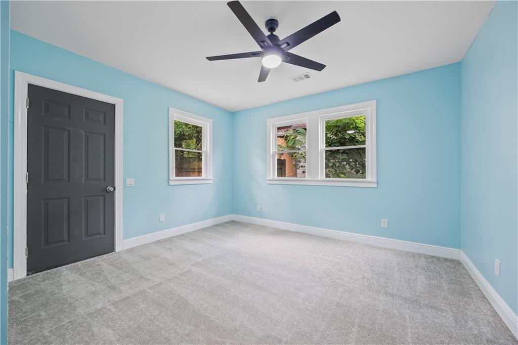 1658 Temple Avenue Atlanta, GA 30337 - Photo 22 of 27 a view of an empty room with a window
