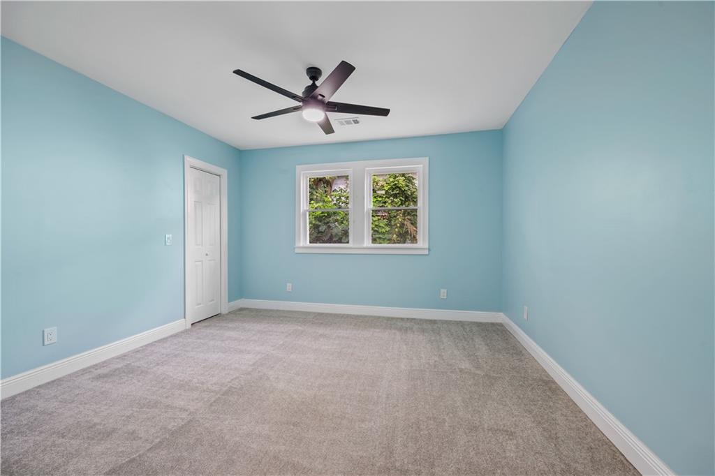 1658 Temple Avenue Atlanta, GA 30337 - Photo 25 of 27 a view of an empty room with a window
