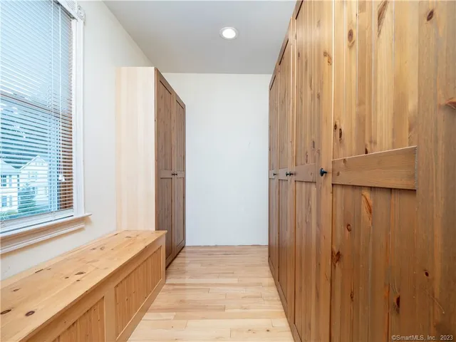 a view of a bathroom with a tub and shower