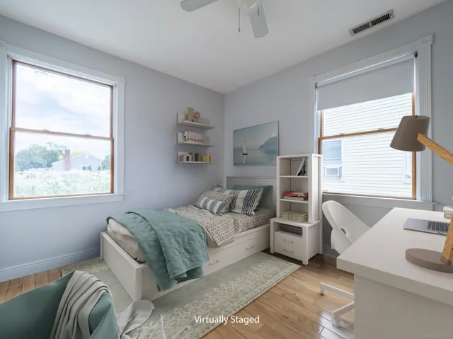 a bed room with a bed and a couch