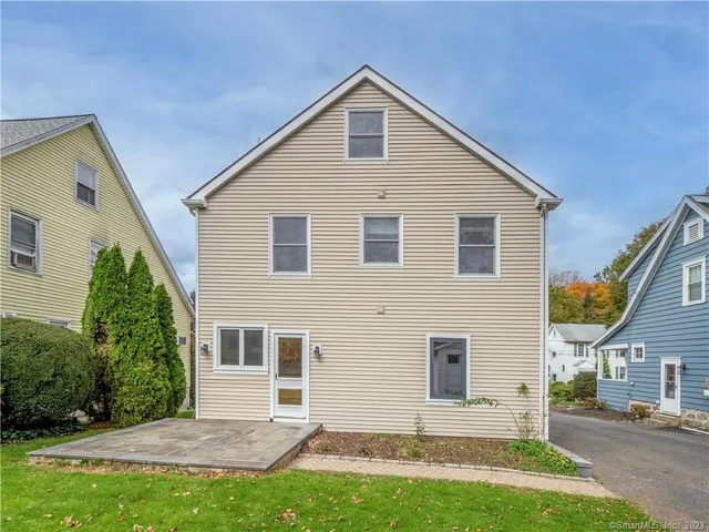 a view of house with yard