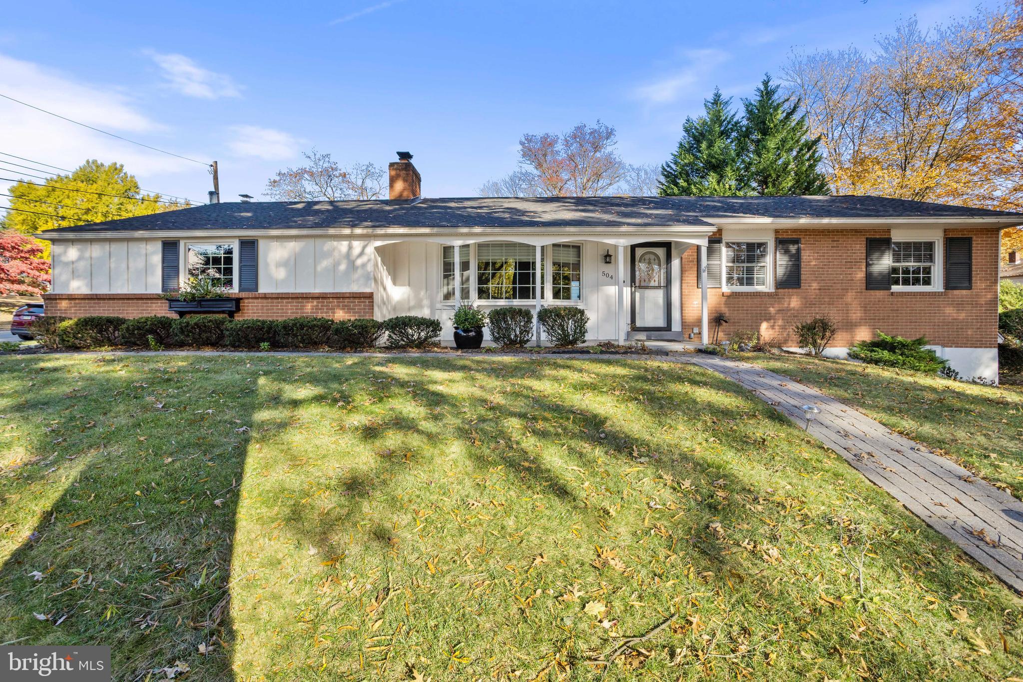 504 Minshall Road Springfield, PA 19064 - Photo 1 of 39 a front view of a house with a yard table and chairs