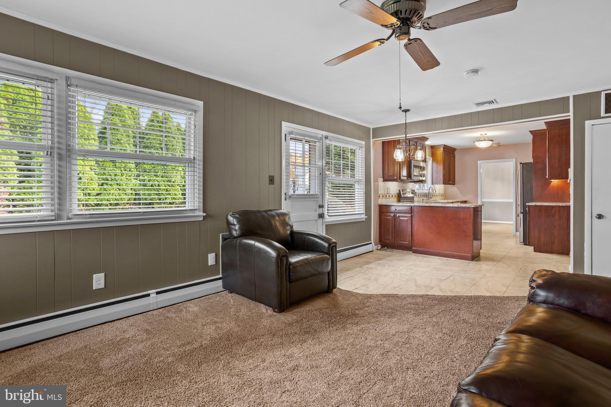 504 Minshall Road Springfield, PA 19064 - Photo 15 of 39 a living room with furniture and a window