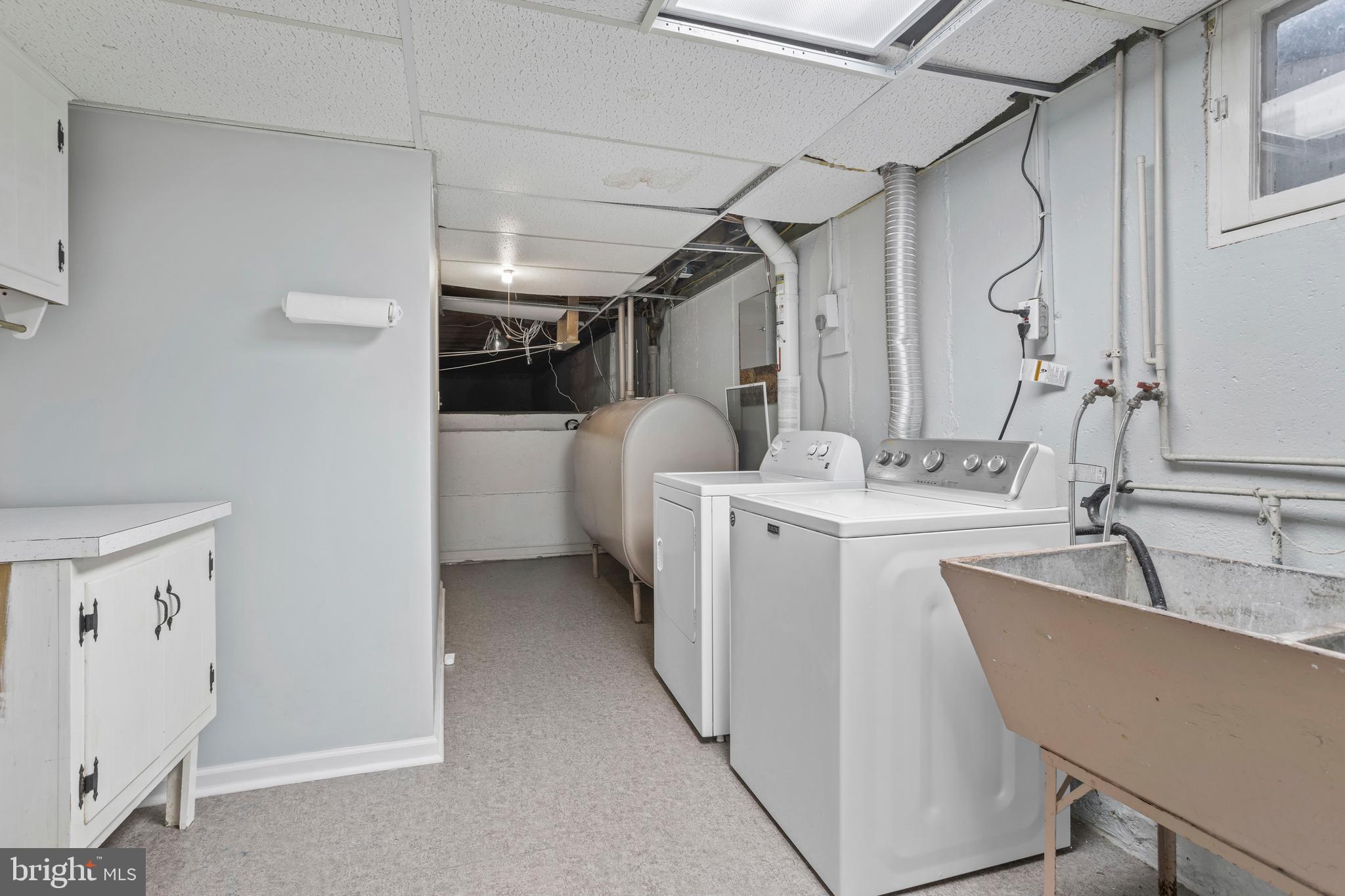 504 Minshall Road Springfield, PA 19064 - Photo 32 of 39 a utility room with cabinets