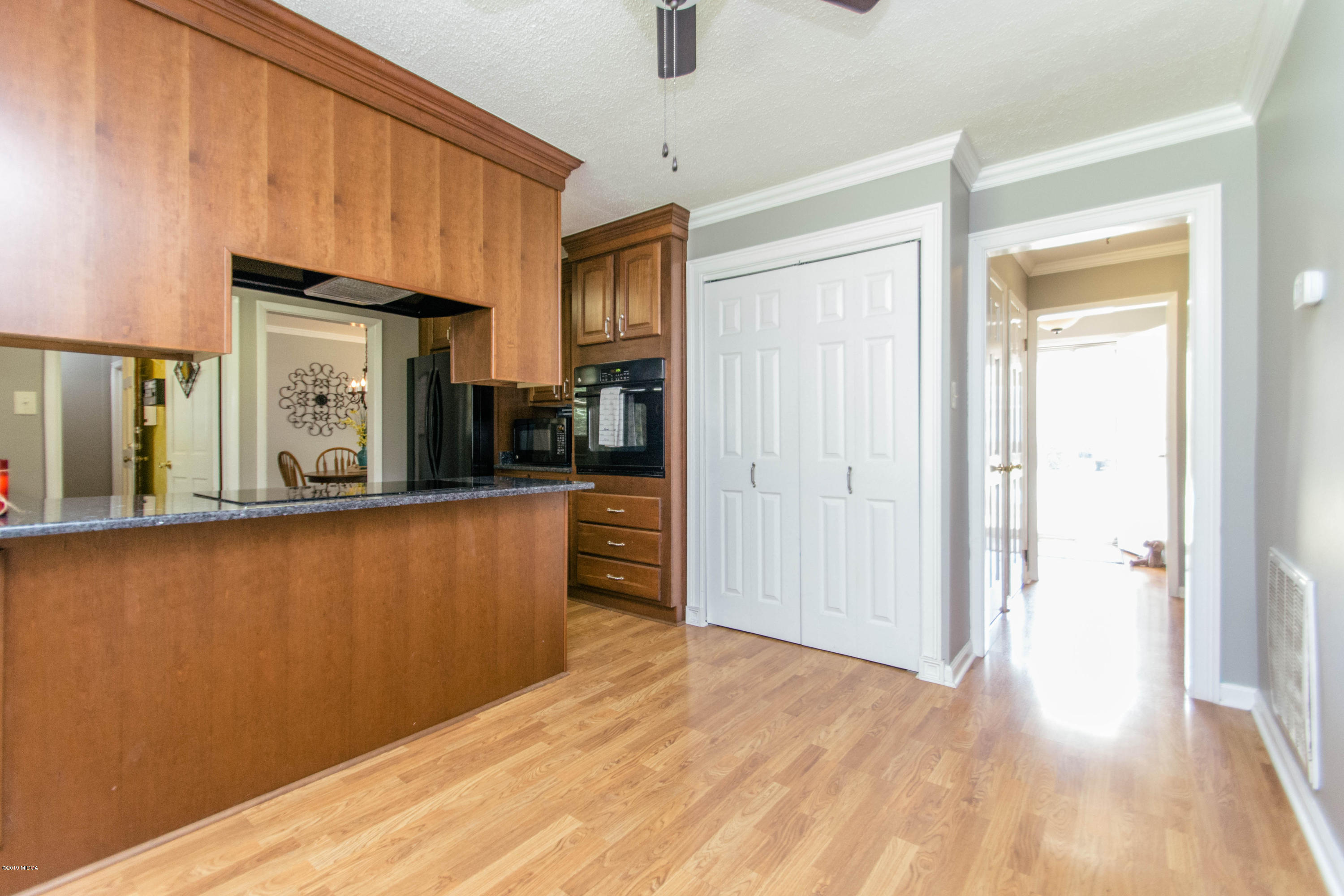 1403 Cambridge Road Perry, GA 31069 - Photo 11 of 38 a view of kitchen and utility room