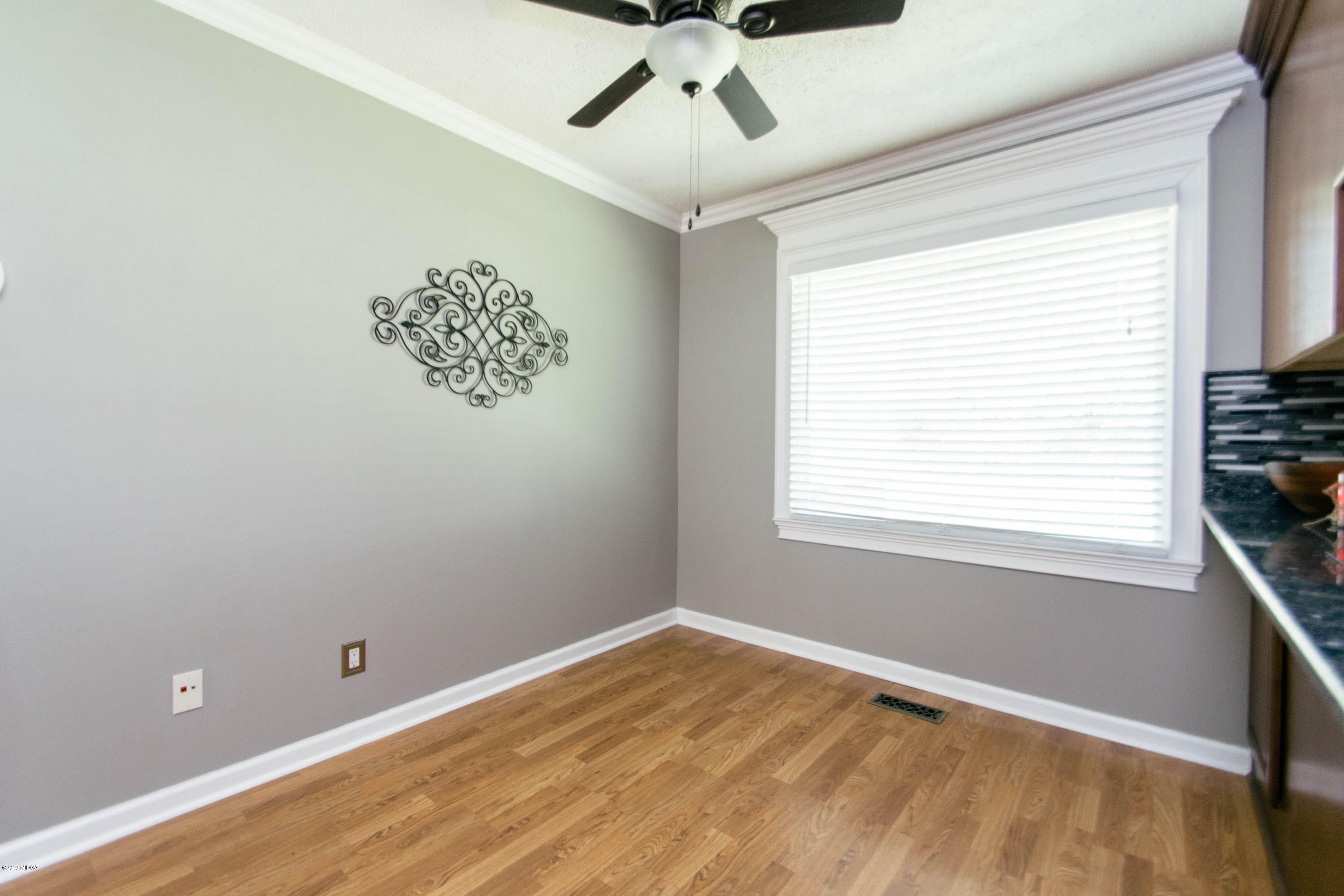 1403 Cambridge Road Perry, GA 31069 - Photo 12 of 38 a view of an empty room with a window