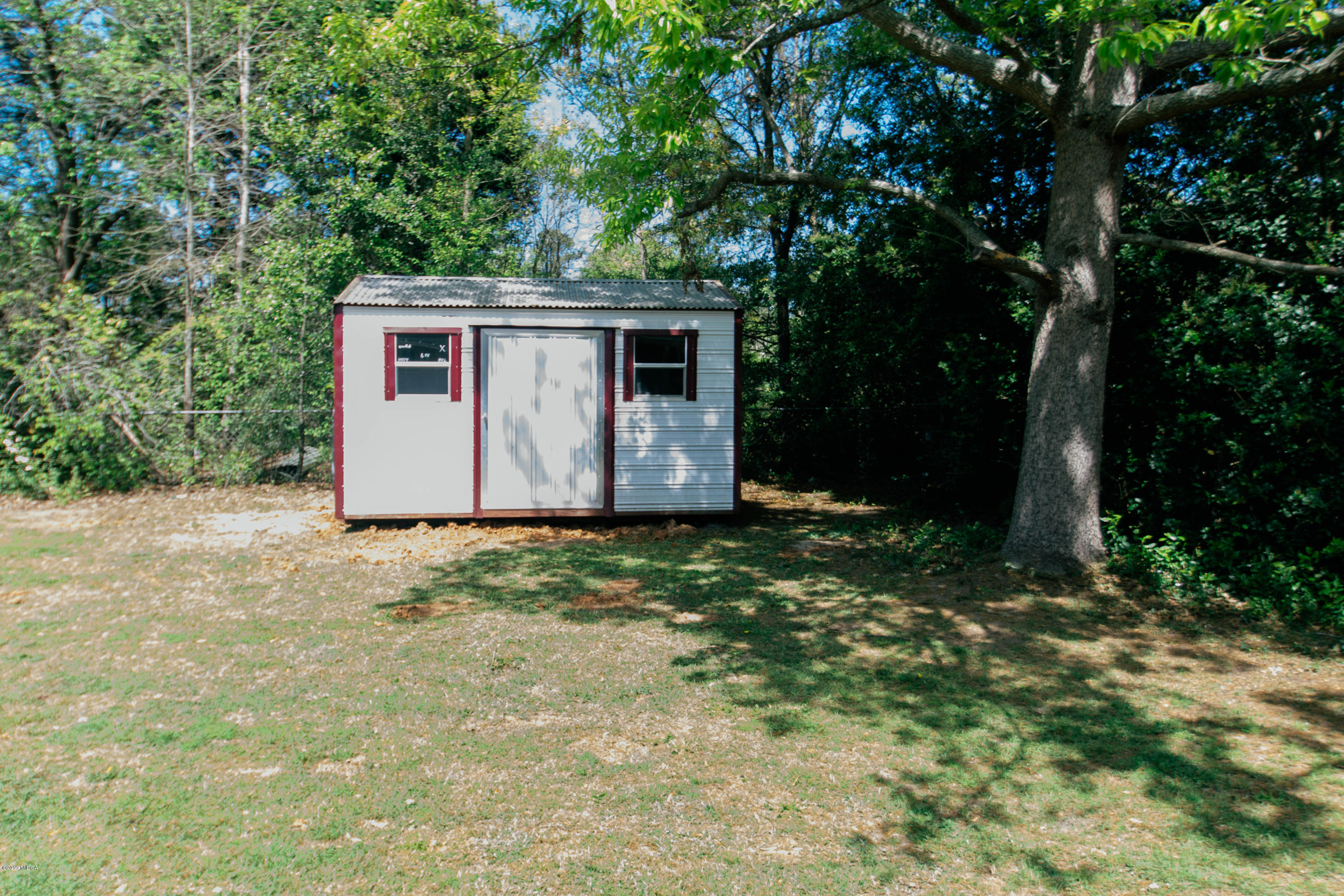 1403 Cambridge Road Perry, GA 31069 - Photo 34 of 38 a view of a backyard