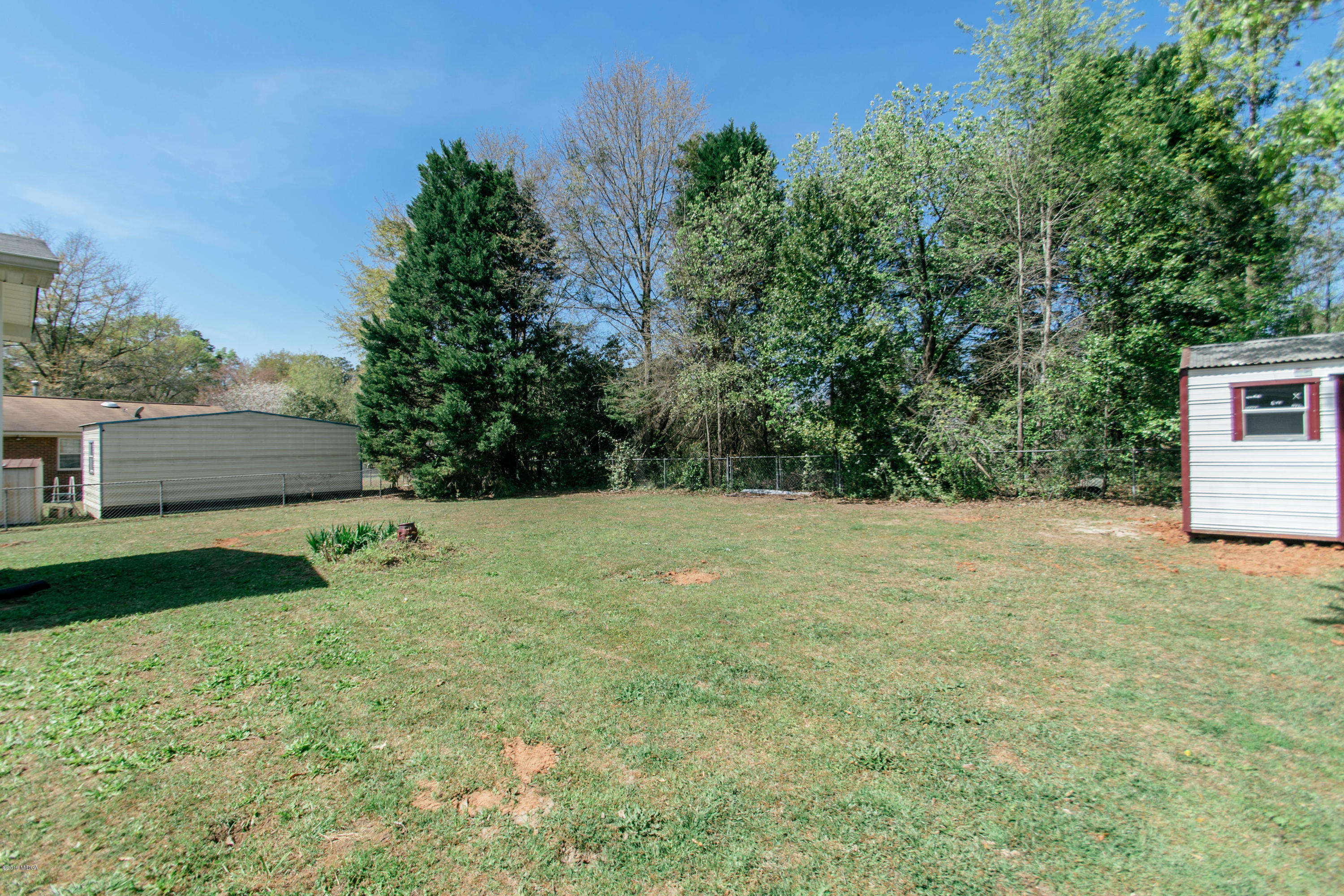 1403 Cambridge Road Perry, GA 31069 - Photo 35 of 38 a view of a backyard