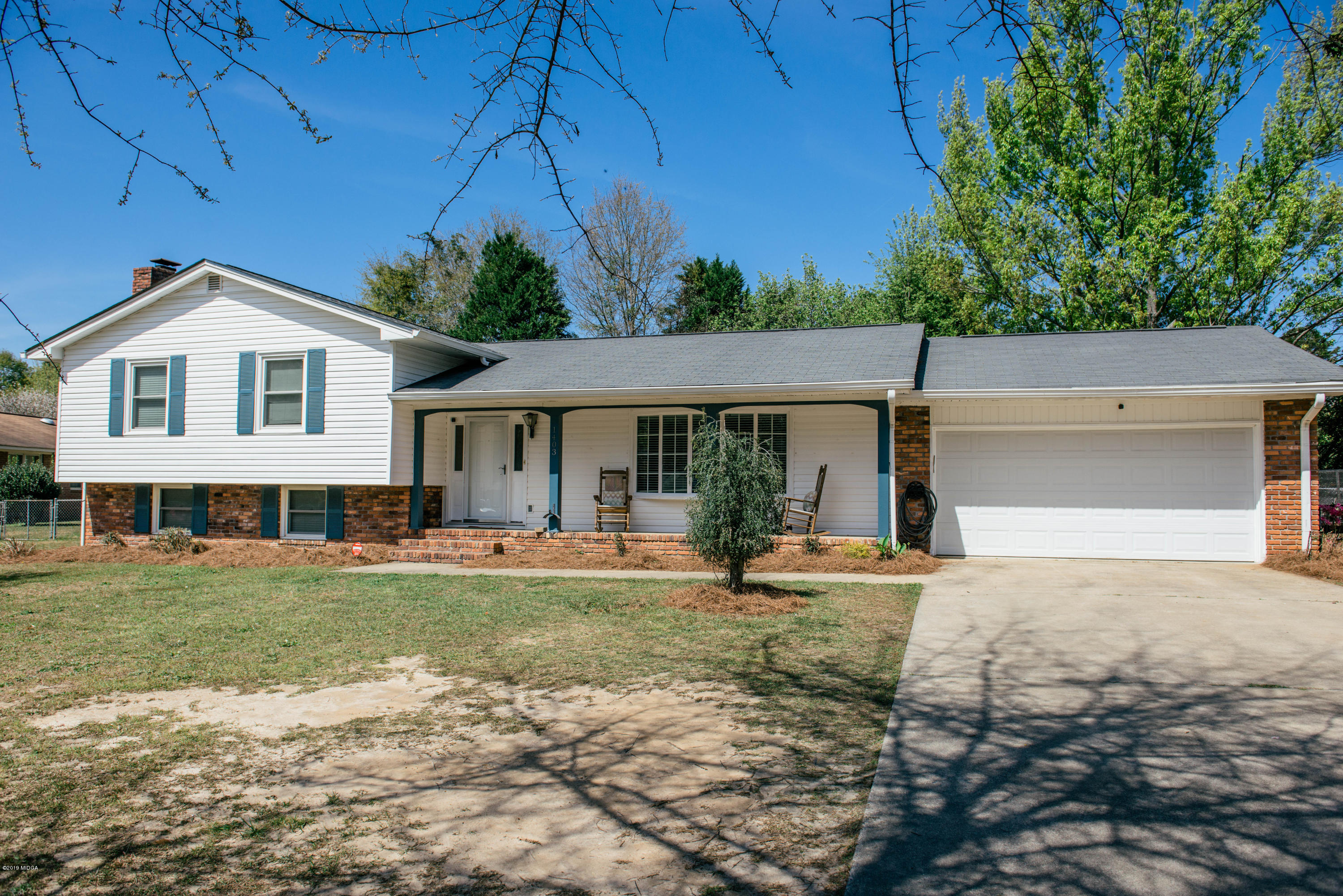 1403 Cambridge Road Perry, GA 31069 - Photo 38 of 38 a house view with a garden space