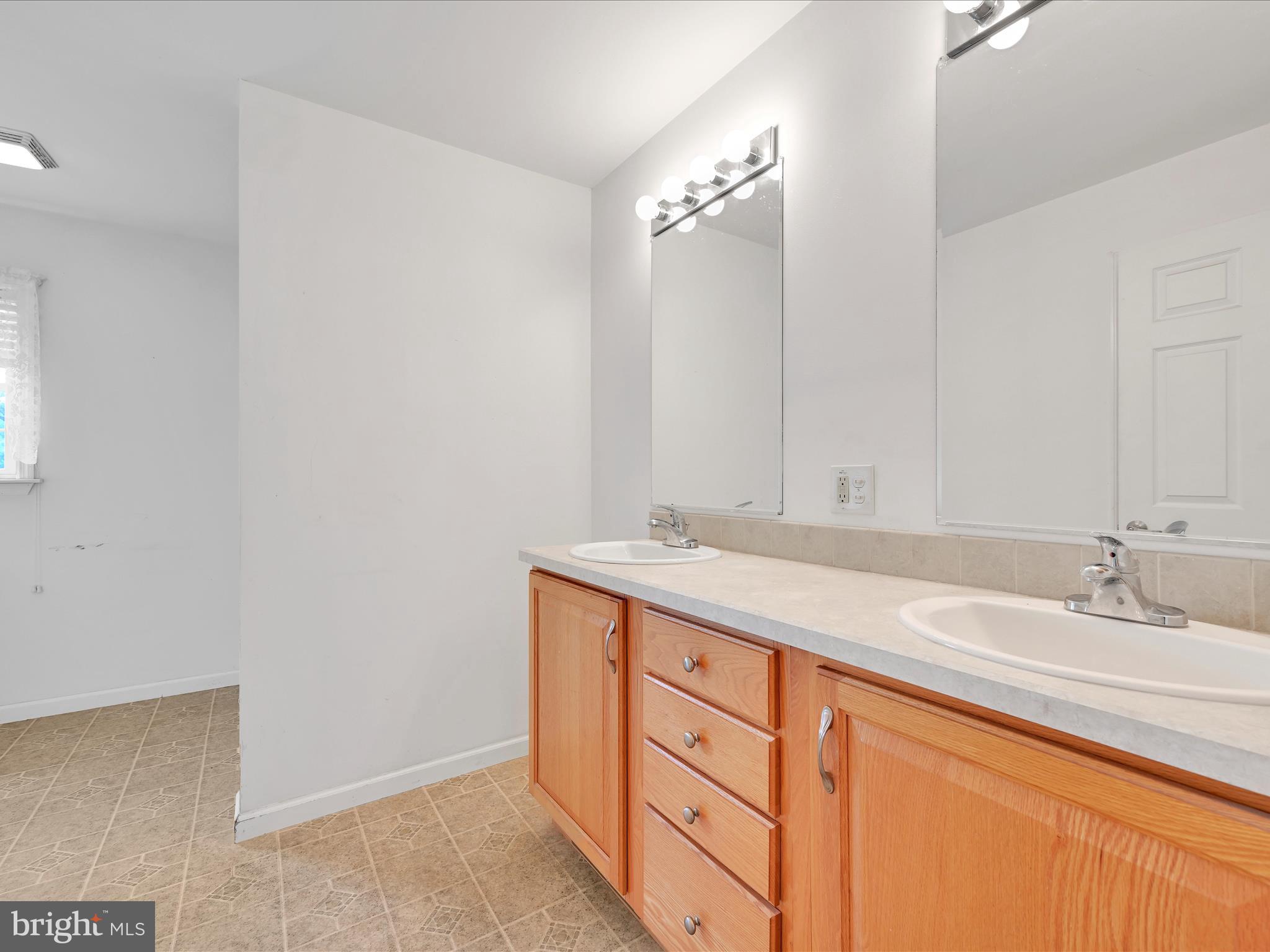 67 Parallel Road Pine Grove, PA 17963 - Photo 22 of 46 a bathroom with a sink and a mirror