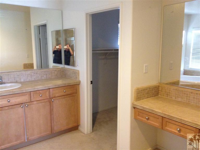 83449 Stagecoach Road Indio, CA 92203 - Photo 11 of 16 a view of a sink and a refrigerator in a bathroom