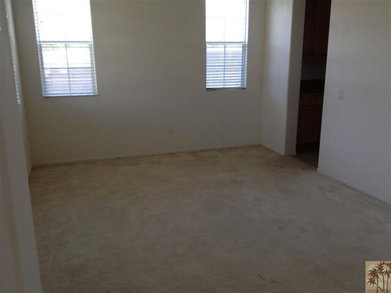 83449 Stagecoach Road Indio, CA 92203 - Photo 8 of 16 an empty room with windows