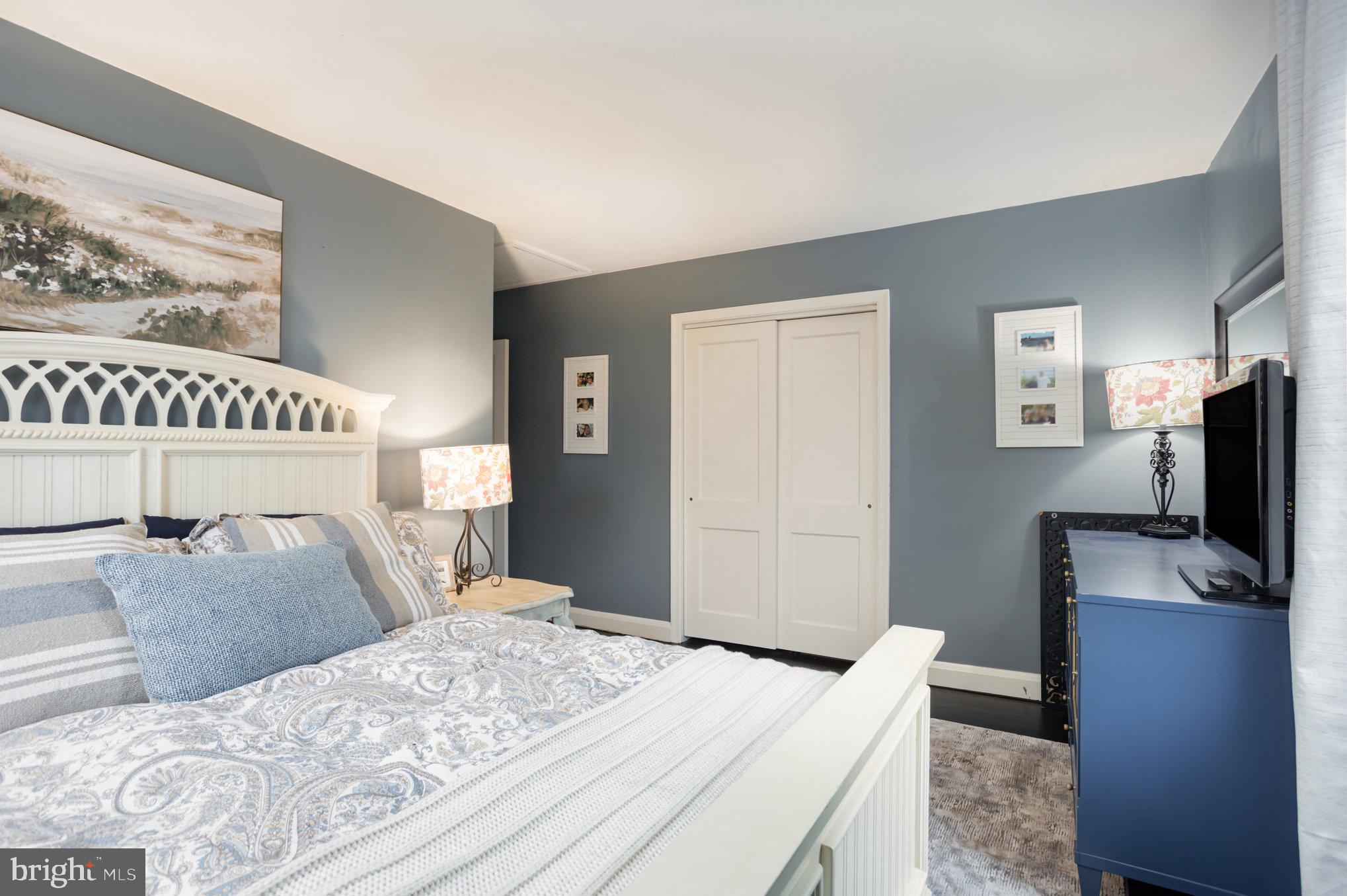 1500 Doxbury Road Baltimore, MD 21286 - Photo 23 of 36 a bedroom with a bed and a flat screen tv