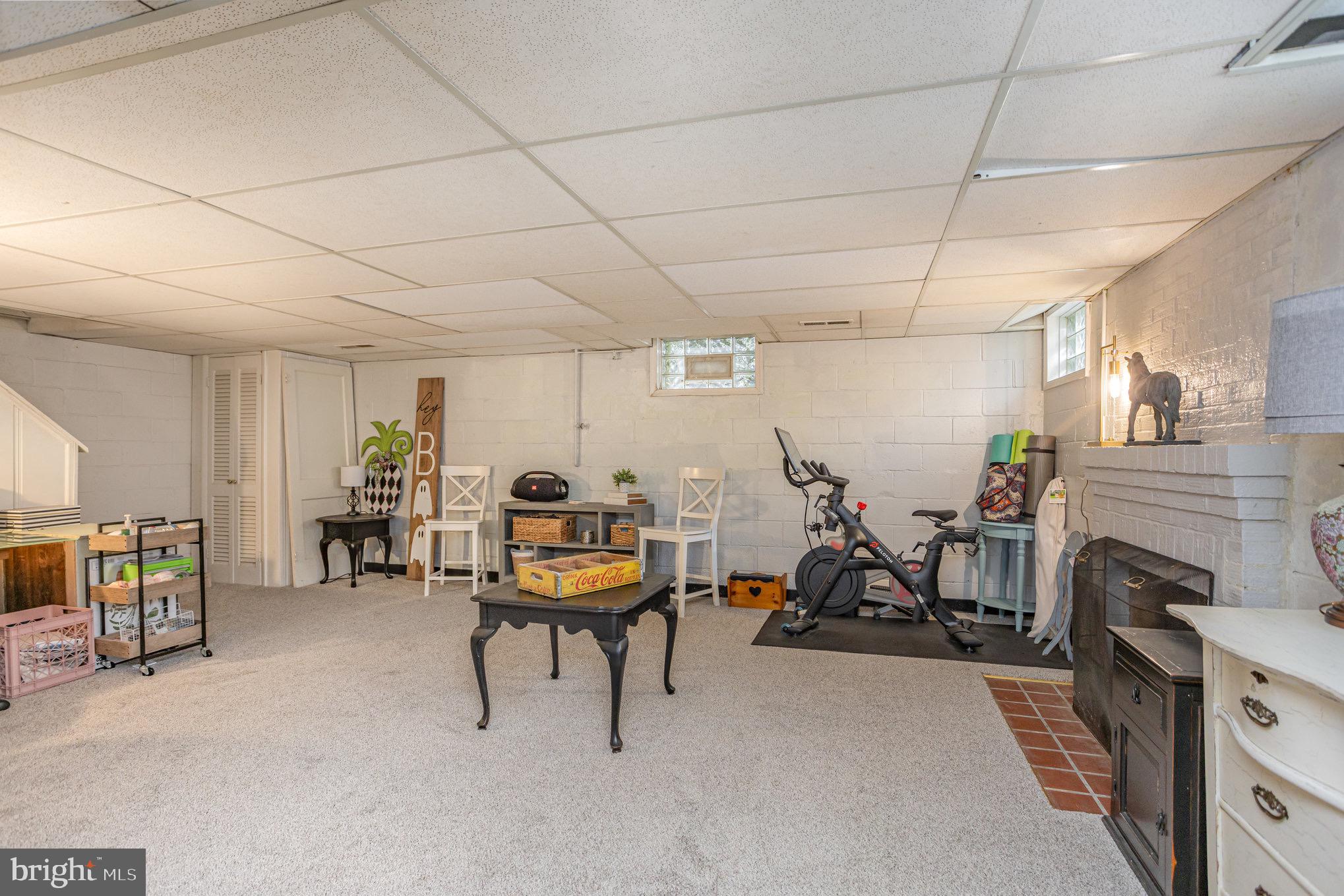 1500 Doxbury Road Baltimore, MD 21286 - Photo 27 of 36 a view of a dentist room with furniture and a fireplace