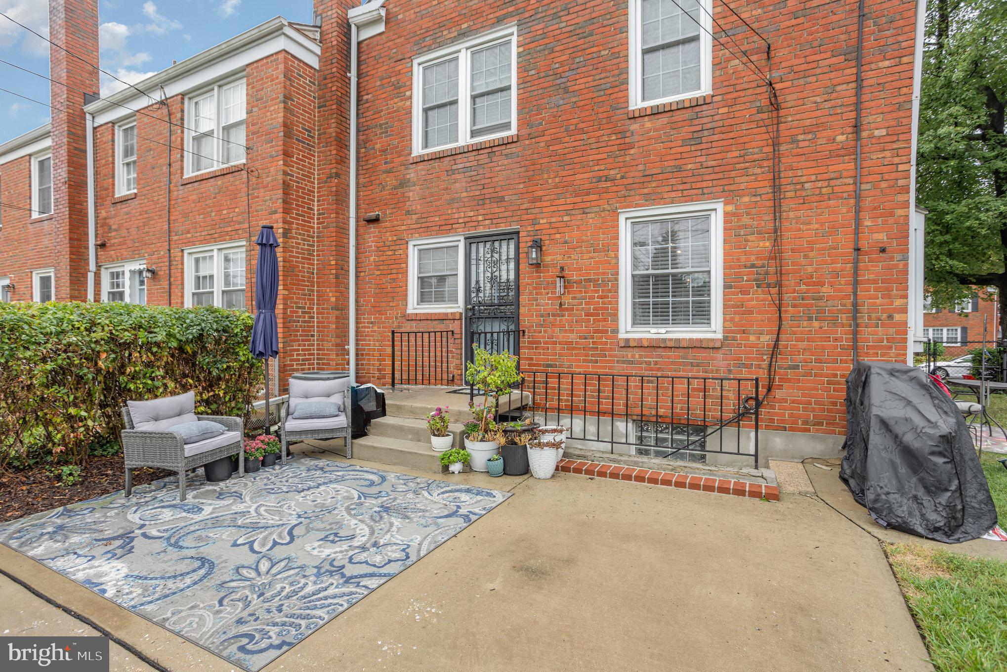 1500 Doxbury Road Baltimore, MD 21286 - Photo 32 of 36 a view of a brick building with many windows