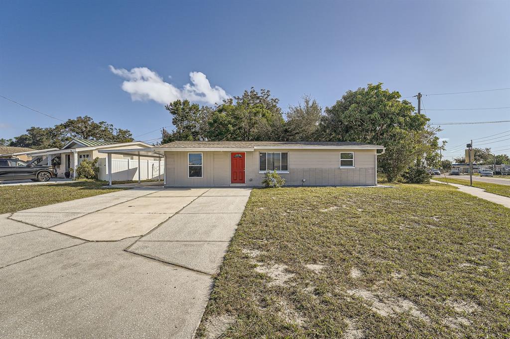 4506 Grand Central Avenue New Port Richey, FL 34652 - Photo 1 of 1 a house view with a garden space