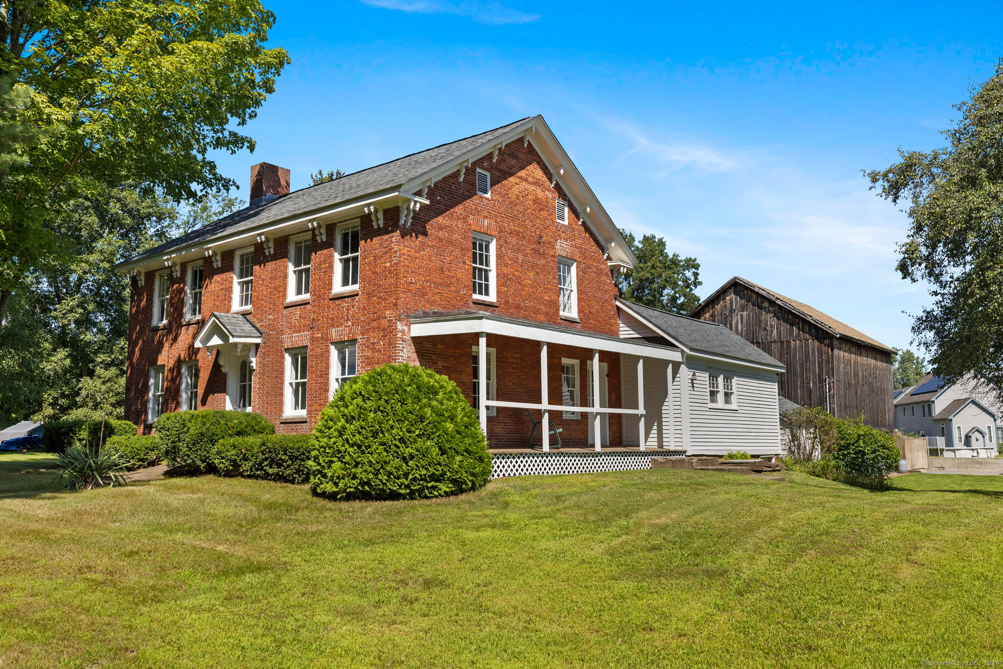 76 Griffin Road East Windsor, CT 06016 - Photo 1 of 1 a front view of a house with a garden