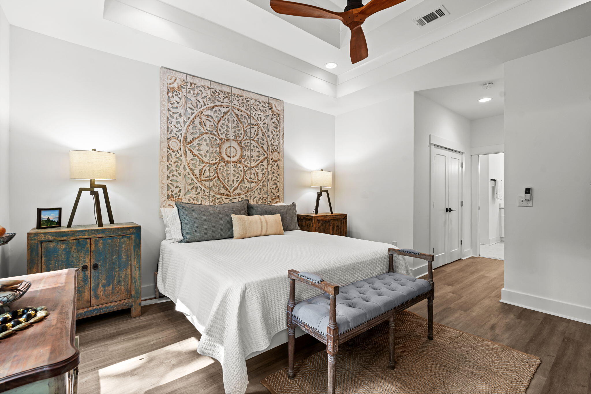 85 6th Street Santa Rosa Beach, FL 32459 - Photo 15 of 35 a bedroom with a bed a table and painting