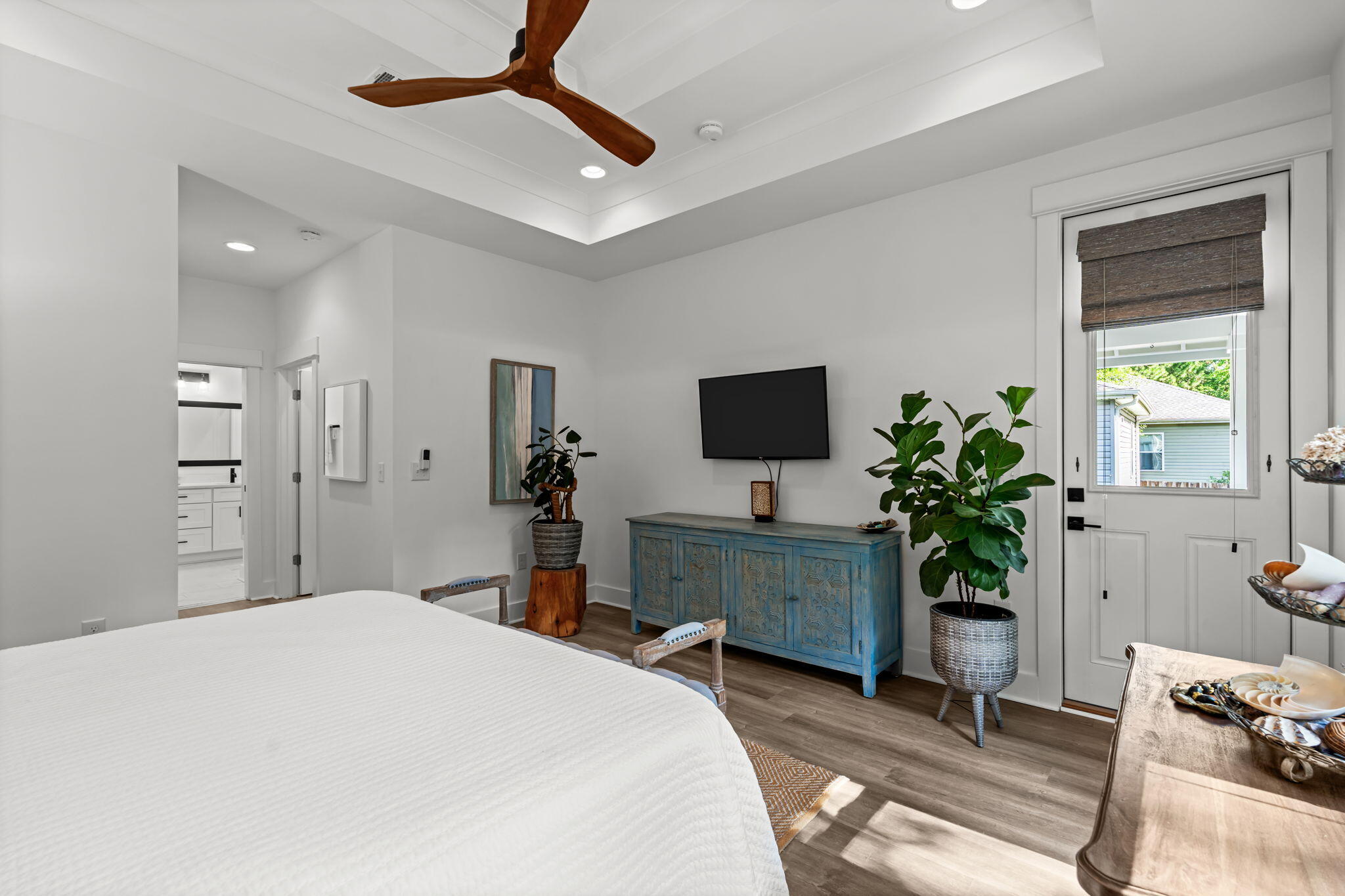 85 6th Street Santa Rosa Beach, FL 32459 - Photo 16 of 35 a bedroom with a bed and a flat screen tv