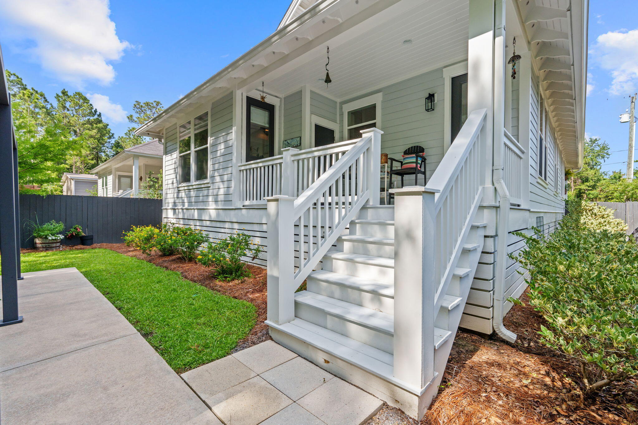 85 6th Street Santa Rosa Beach, FL 32459 - Photo 27 of 35 a front view of a house with a yard