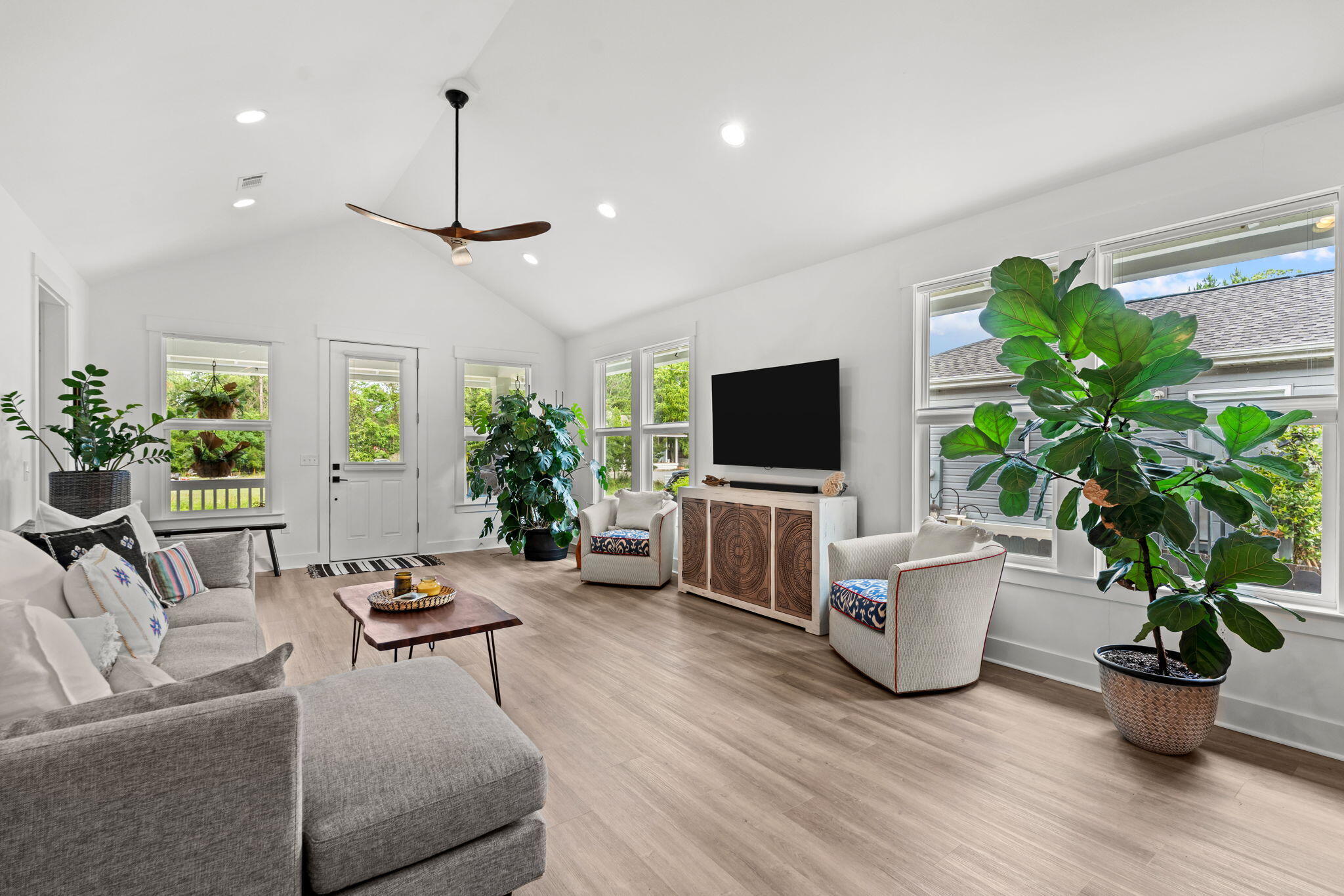 85 6th Street Santa Rosa Beach, FL 32459 - Photo 7 of 35 a living room with furniture potted plant and a flat screen tv