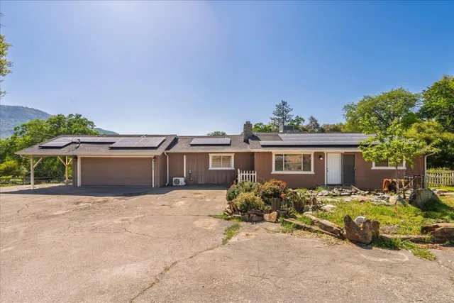 front view of a house with a patio