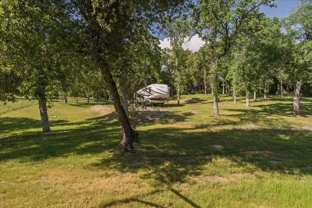 a swimming pool with wooden fence