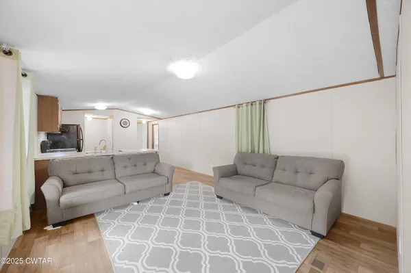 a living room with furniture and a couch