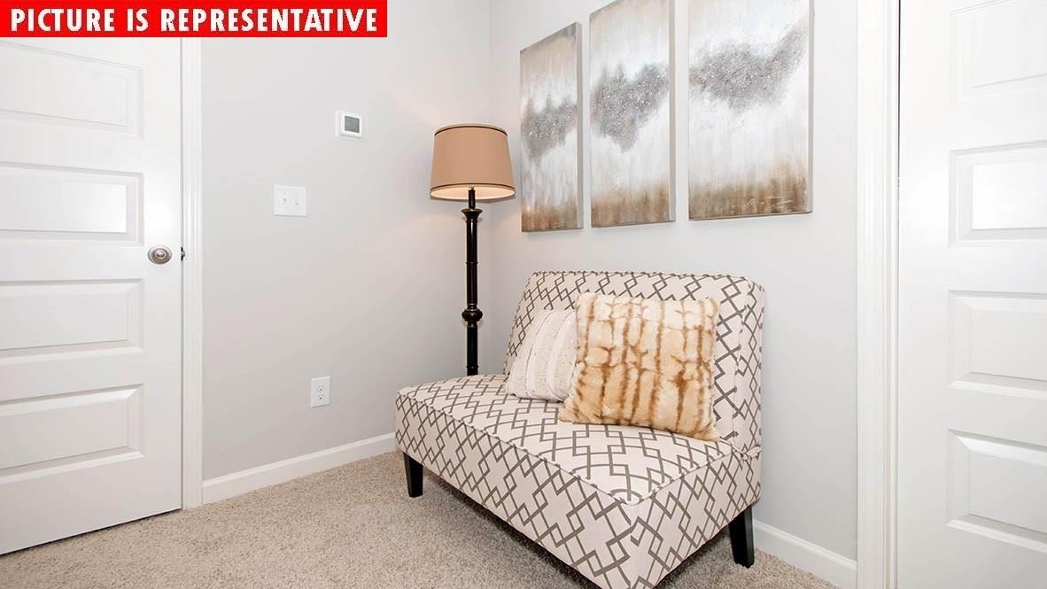 1204 Secrest Cmns Drive Monroe, NC 28112 - Photo 21 of 22 a bedroom with a bed and lamp