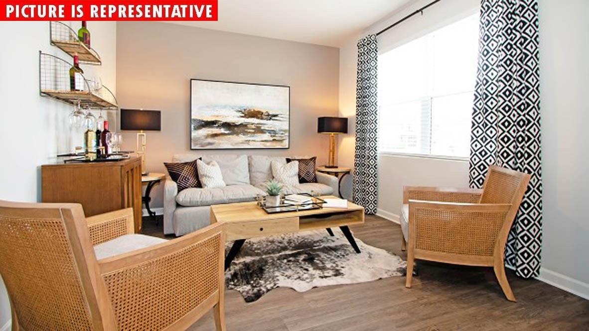 1204 Secrest Cmns Drive Monroe, NC 28112 - Photo 4 of 22 a living room with furniture and a wooden floor