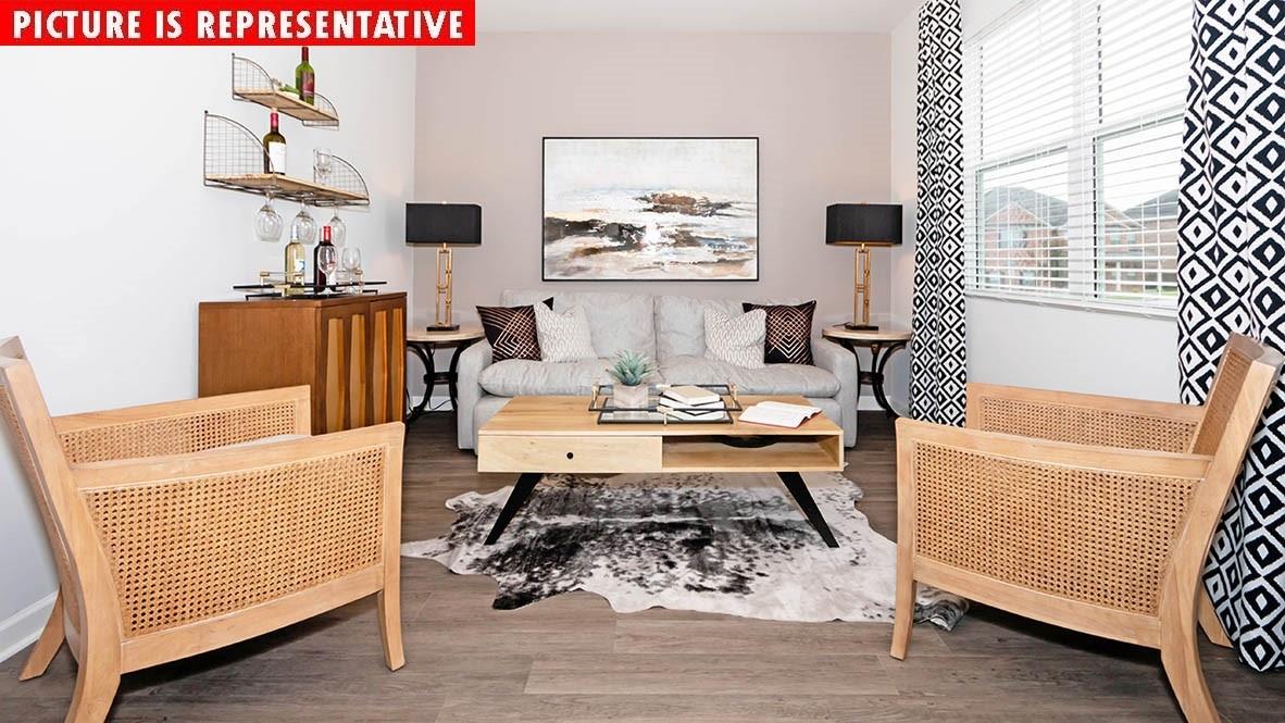 1204 Secrest Cmns Drive Monroe, NC 28112 - Photo 5 of 22 a living room with furniture and a table