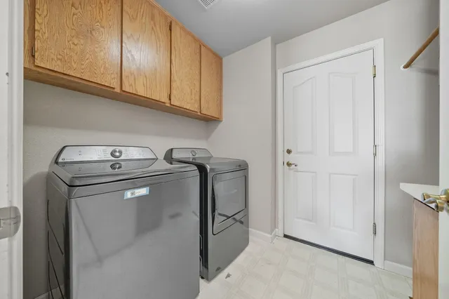 a view of a balcony with wooden floor
