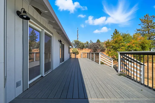 a view of a balcony with outdoor space