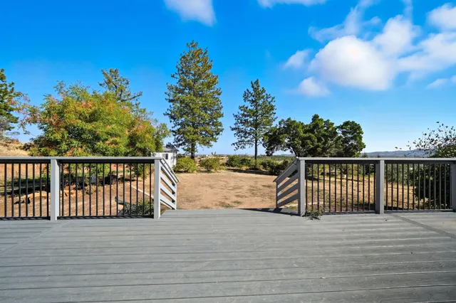 a house view with a backyard space