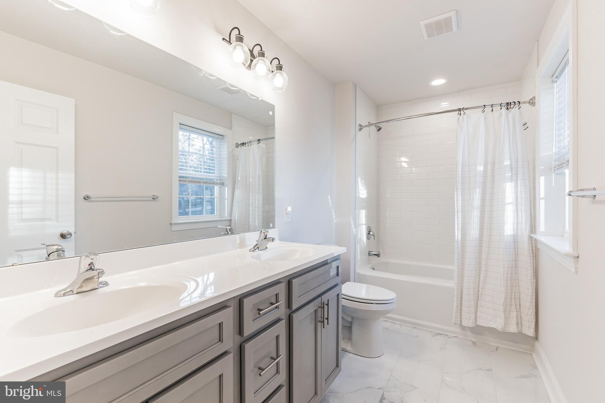 235 Howarth Road Media, PA 19063 - Photo 31 of 46 Tiled hall bath