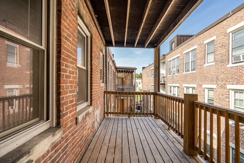 41 Orkney Road Boston, MA 02135 - Photo 17 of 28 a view of balcony with wooden floor