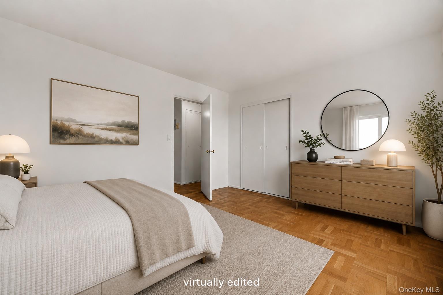 21-66 33rd Road, Unit 12B Queens, NY 11106 - Photo 16 of 23 a bed room with a bed mirror and a window