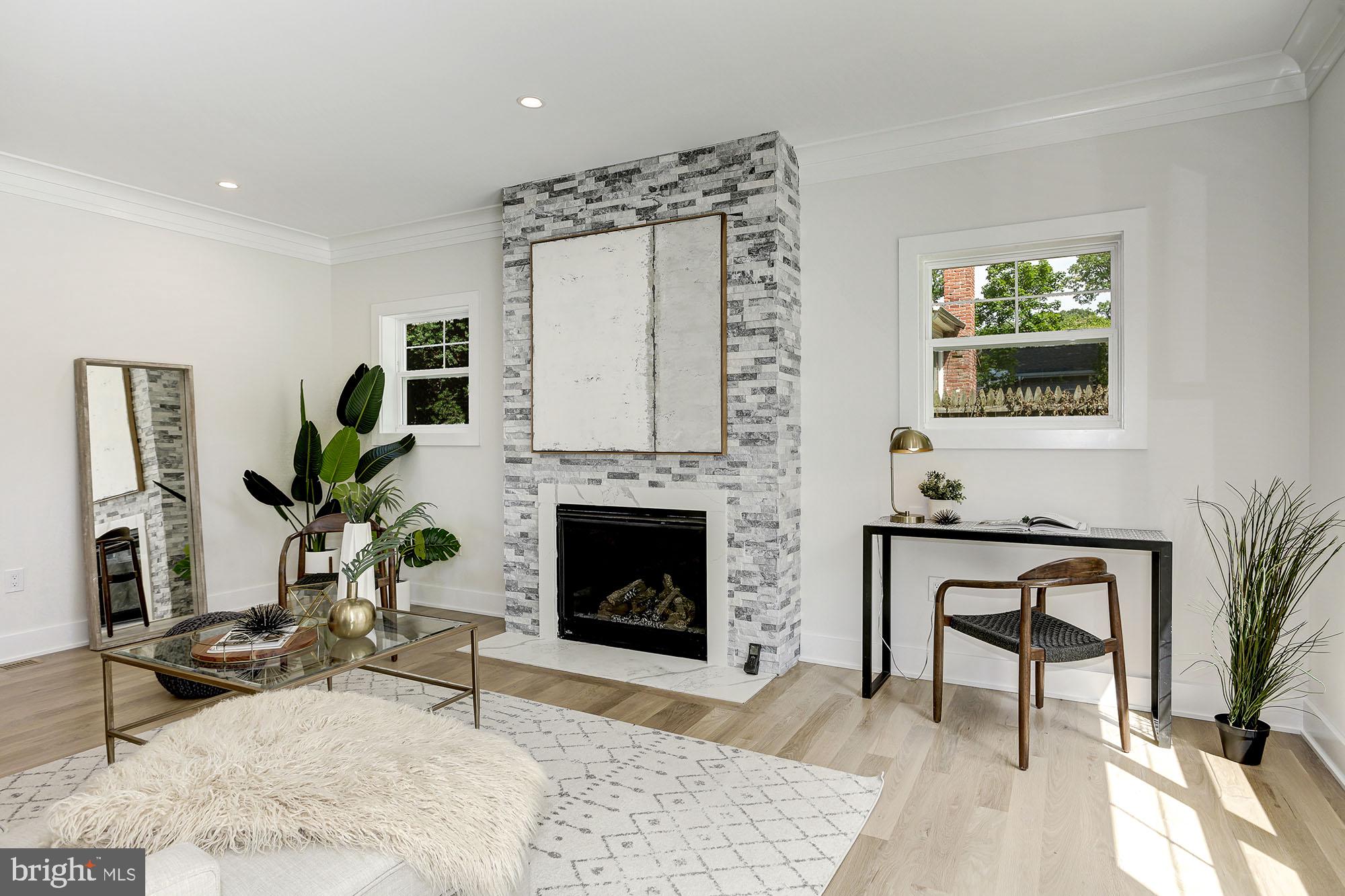 2902 Jennings Road Kensington, MD 20895 - Photo 14 of 42 Enjoy gas stove with modern stone hearth