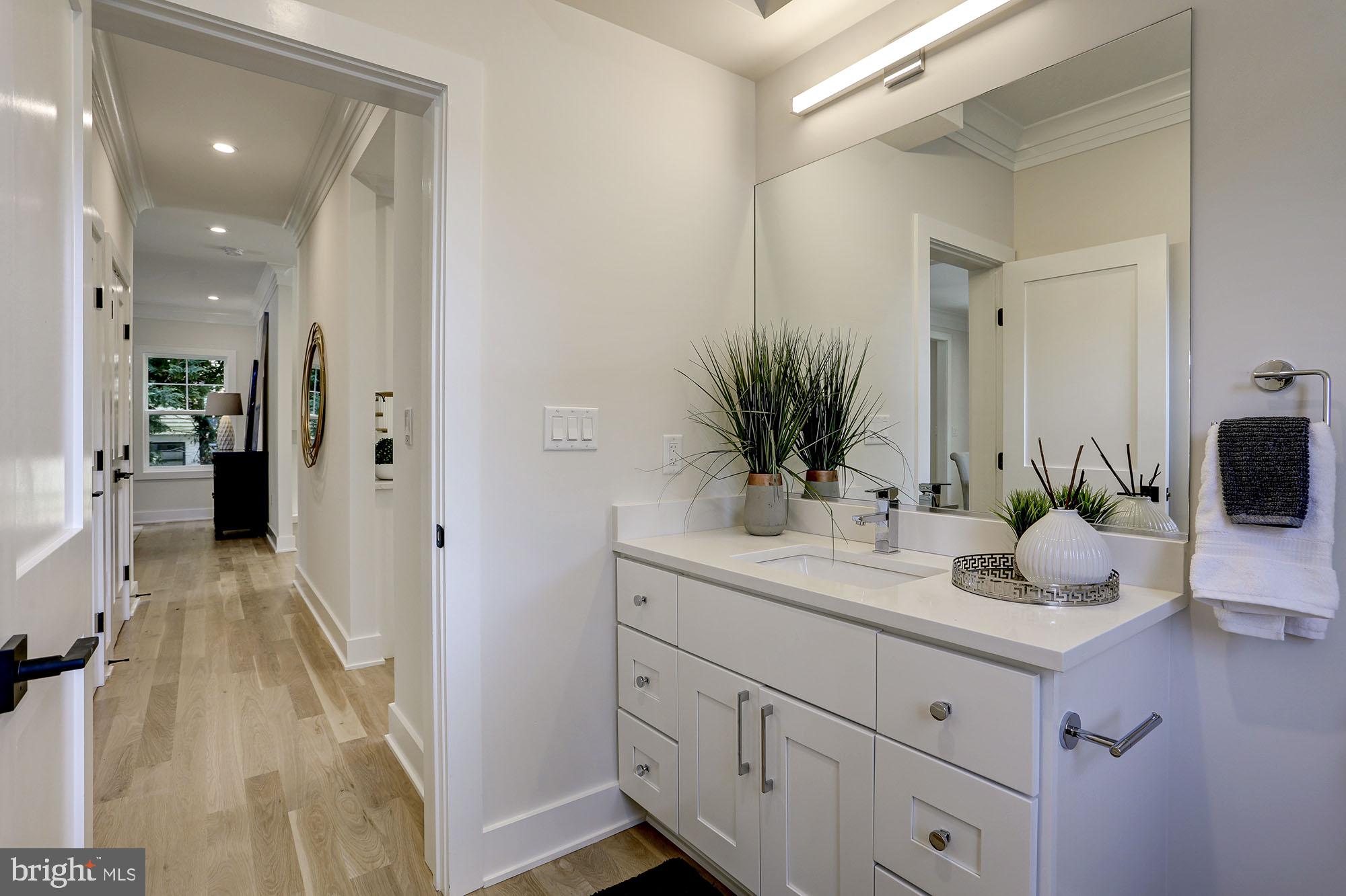 2902 Jennings Road Kensington, MD 20895 - Photo 15 of 42 First floor powder room off rare pantry hallway