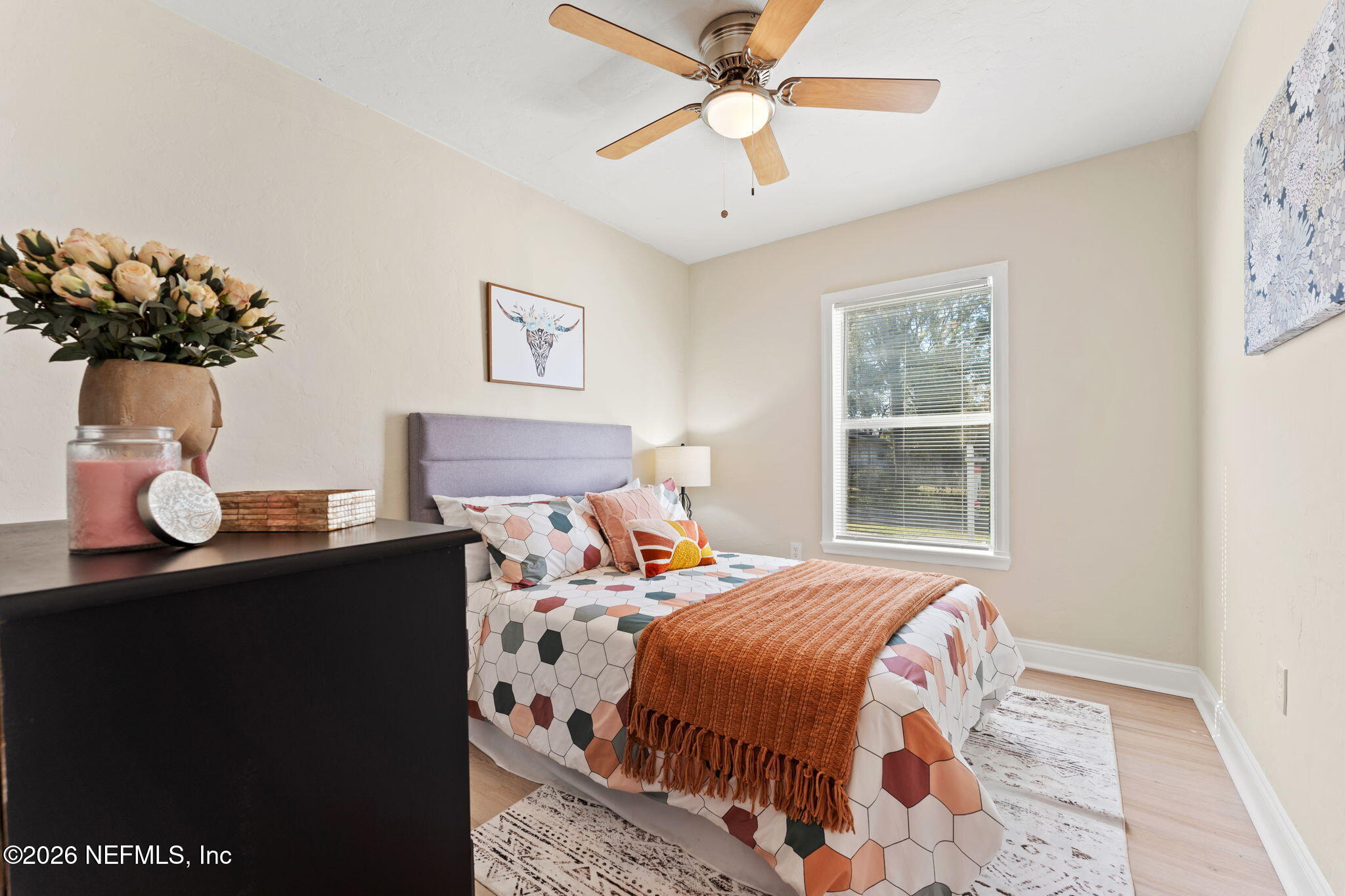 4517 Delta Avenue Jacksonville, FL 32205 - Photo 14 of 25 a bedroom with a bed and a chandelier