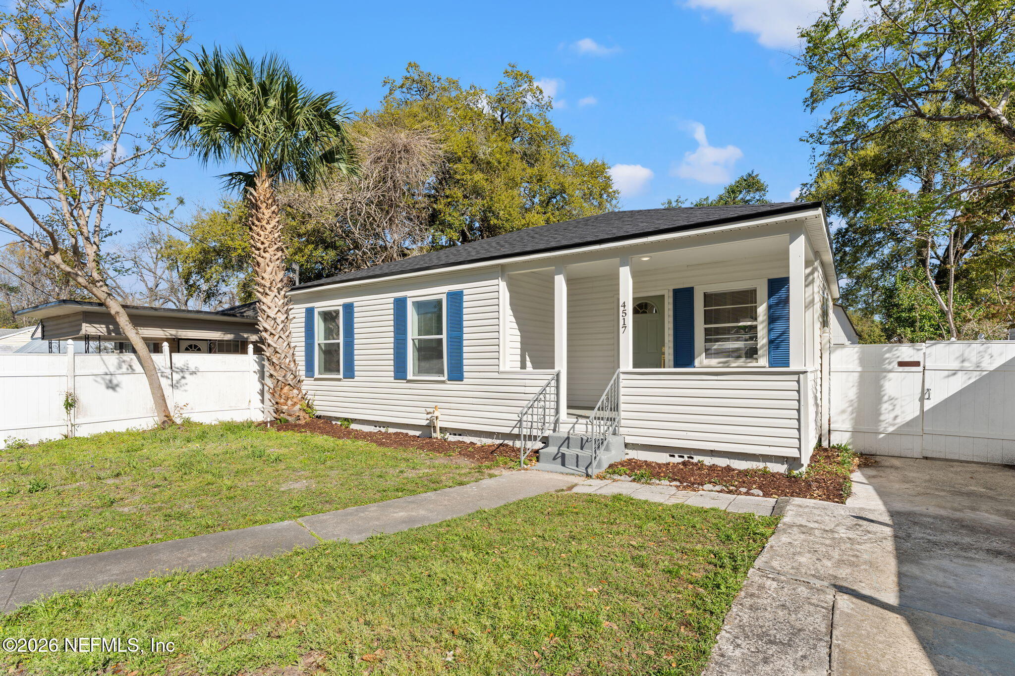 4517 Delta Avenue Jacksonville, FL 32205 - Photo 2 of 25 a house with trees in the background
