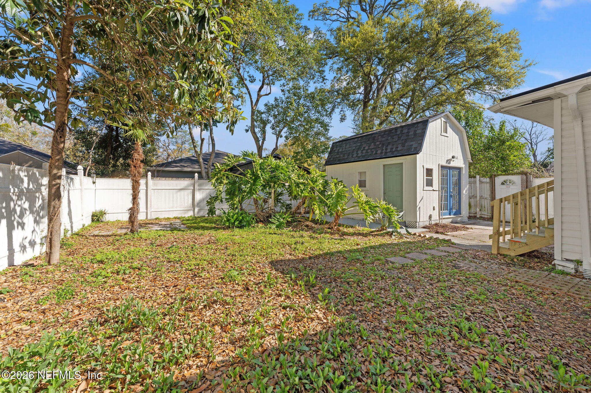 4517 Delta Avenue Jacksonville, FL 32205 - Photo 22 of 25 a house with trees in front of it